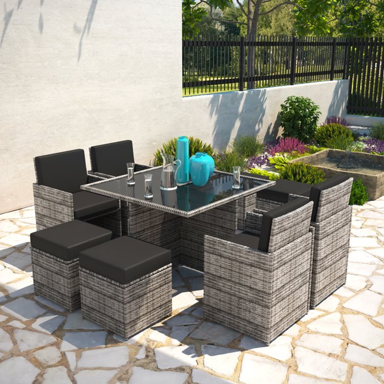 Modica 8 Seater Cube Dining Set in a sunny white plaster garden.